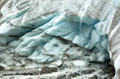 An image of a glacier dripping water.