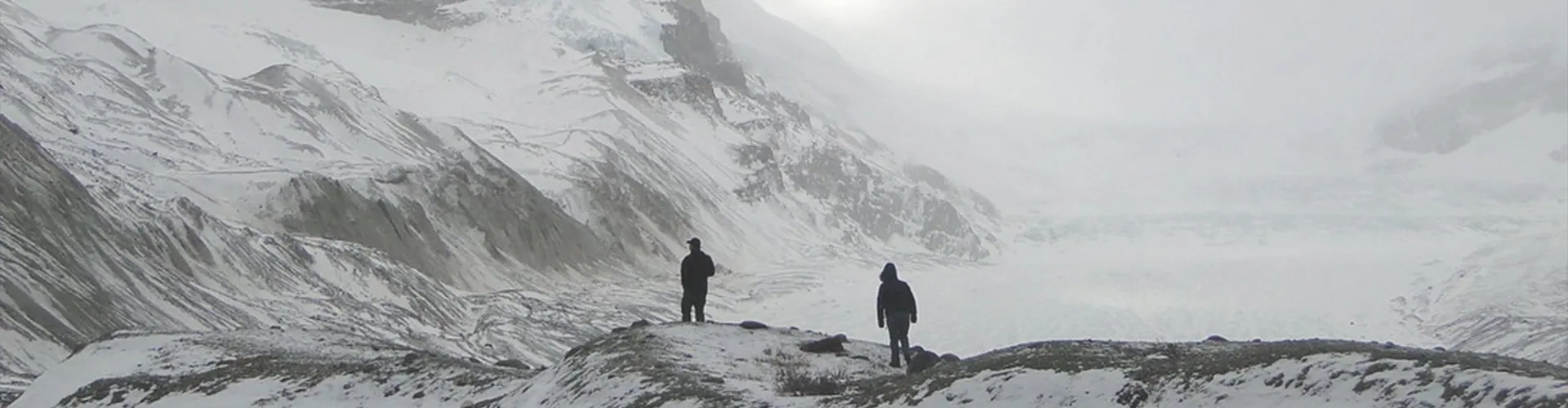 An image of two people hiking on Mount Athabasca.